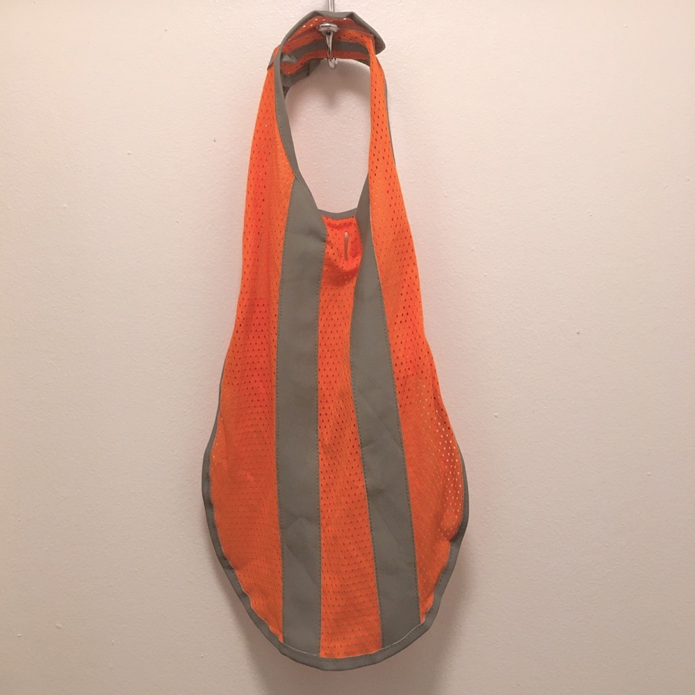 Dog size M/L reflective orange safety vest.